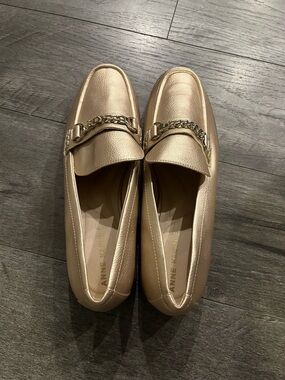 Anne Klein Metallic Gold Chain-Trim Loafers